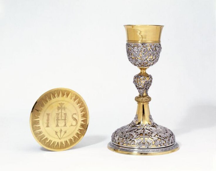 A gold chalice and paten