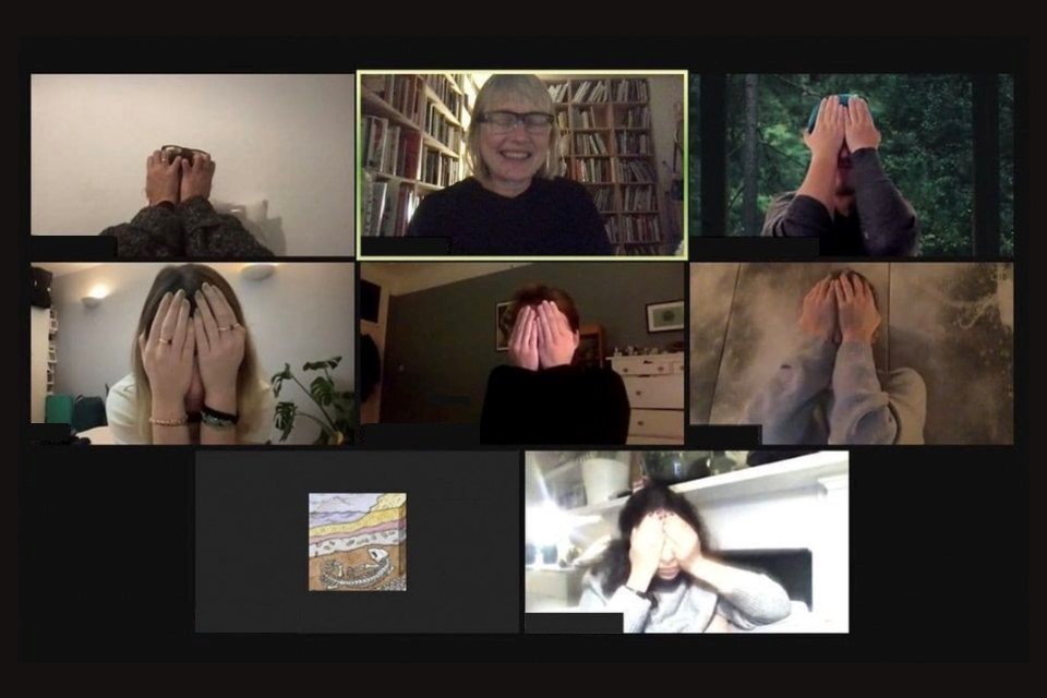 screenshot of a Zoom meeting, screens of seven people, six of whom are covering their eyes with their hands, the seventh has their eyes shut - another screen with a small artwork image of a geological cross-section including a skeleton