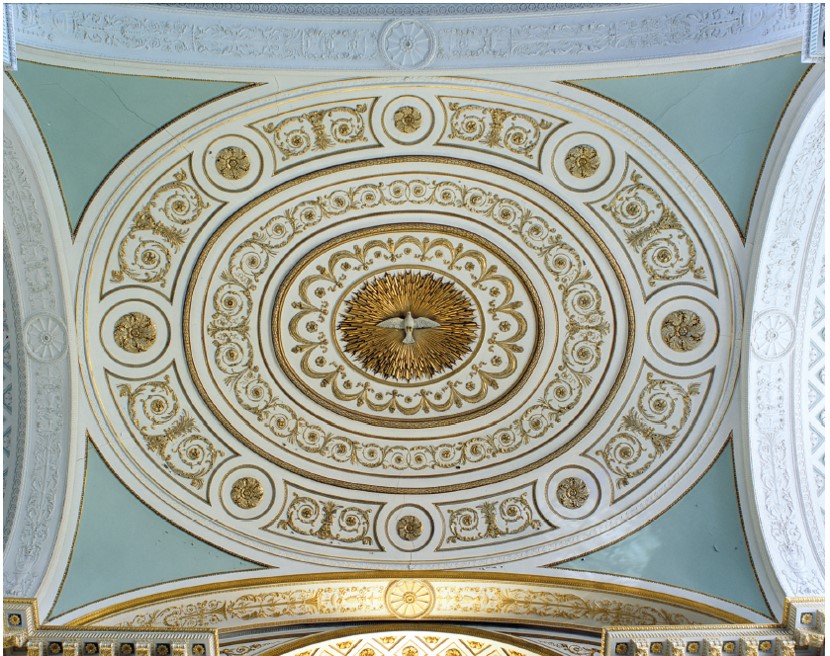 interior dome seen from below. the dome is ornate and features a white dove at the centre, surrounded by gold embellishments